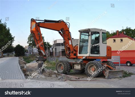 Excavator Builtup Areas On Construction Site Stock Photo Edit Now