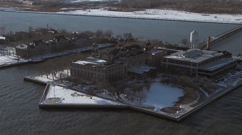 48k Stock Footage Aerial Video Of Ellis Island Buildings With Snow