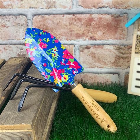 Some have a spray bottle, or a few extras, like an apron or kneeling pad, but these sets are all about the tools included. Personalised Blue Floral Garden Tool Set - Gardening Queen ...