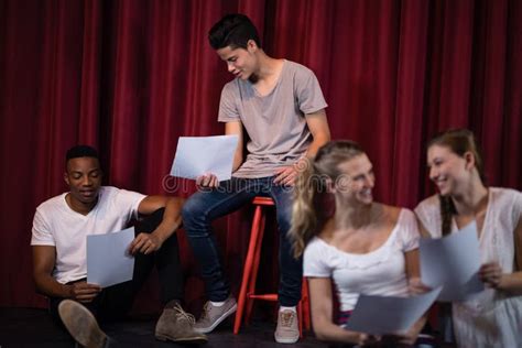 Actors Reading Their Scripts On Stage Stock Photo Image Of Female