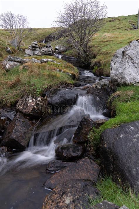 A Small Stream Flowing On Runde Island In Norway Stock Photo Image