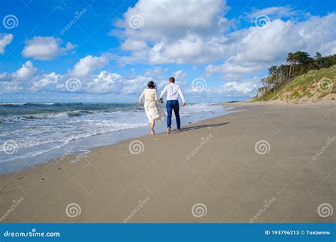Anonymous Couple Running On Beach Stock Image Image Of Paradise