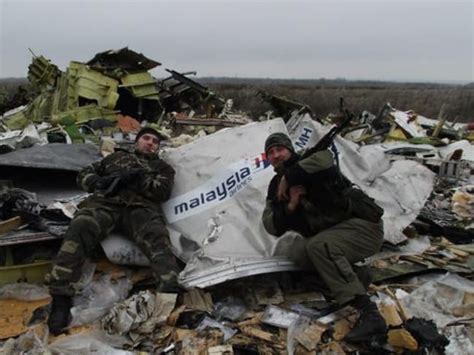 Mh17 Footage Shows Militia Trawling Through Burning Wreckage And