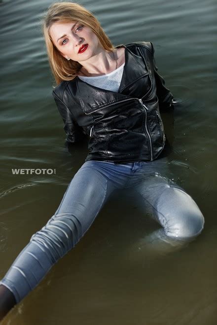 Wetlook By Cute Girl In Leather Jacket And Wet Skinny Jeans In Lake
