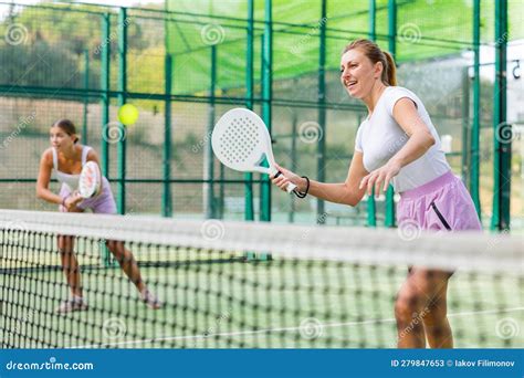 Padel Game Woman With Partners Plays On Tennis Court Stock Image