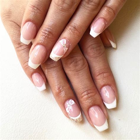 French Nails With A Twist Beautiful Nail Art Detail On Ring Finger