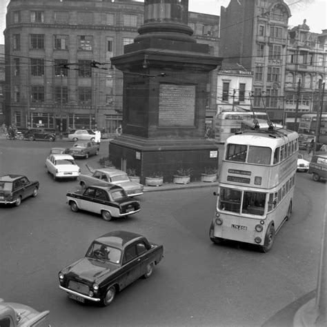 A Trolleybus Heading Past Greys Monument Towards Central Station