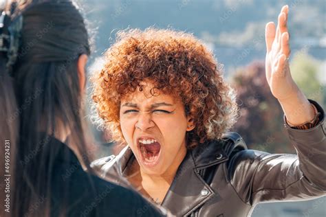 Women Arguing And Yelling In The Street Stock Photo Adobe Stock