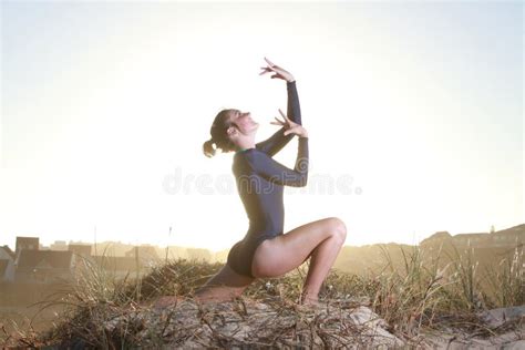 Acrobatic Gymnast Is Doing The Split On The Beach Stock Image Image Of Teen Leap 37450317