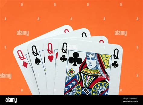 Close Up Of Hand Of 4 Queen Playing Cards Queens Four Of A Kind Stock