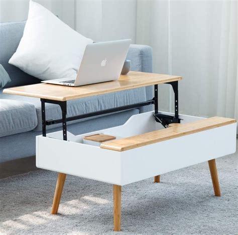 Complete your living room ensemble in modern style with this contemporary coffee table. Multifunctional Lifting Coffee Table - 7 Gadgets