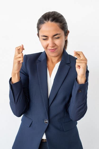 Free Photo Smiling Businesswoman With Crossed Fingers