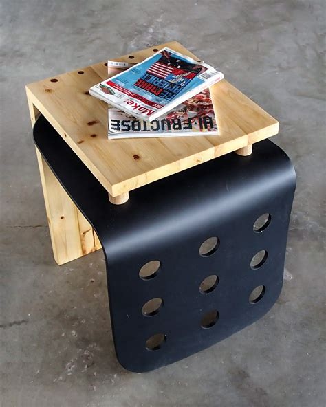 Ikea arm chair in grey gingham pattern. Side table made of a broken Ikea chair combined with fir ...