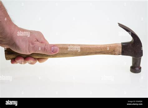 A Carpenter Swinging A Hammer Isolated On White Stock Photo Alamy