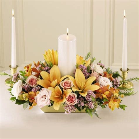 As well as sparkling as the petals slowly open lighting the candles around, it also rotates as the happy birthday tune plays. Unity Flower Candle Centerpiece at Send Flowers