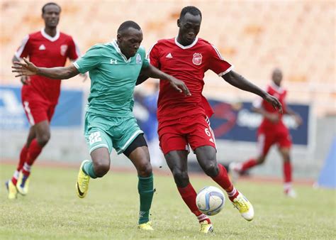 Winners of the kenya national league 19 times. Medie Kagere of Gor Mahia FC contest for ball with Salah ...