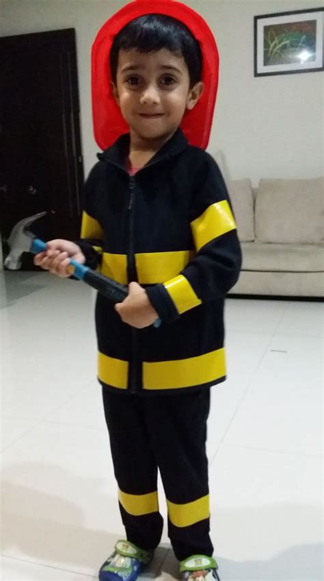 I used pictures from my son's books to get ideas of how to paint it. Quick DIY Fireman Costume | Fireman costume, Diy halloween costumes for kids, Diy fireman costumes