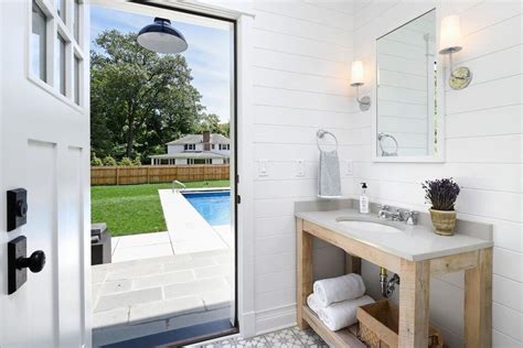 Looking to update your bathroom? cabana bath powder room farmhouse with open to backyard ...