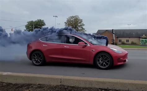 Tesla Model 3 Rolls Coal Gets Revenge With Exhaust Installed