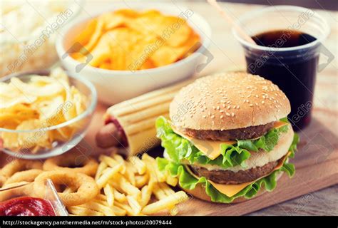 Close Up Of Fast Food Snacks And Drink On Table Royalty Free Photo