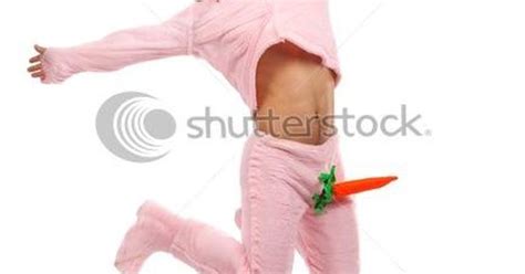 Man Wearing Pick Rabbit Costume With Attached Carrot Penis