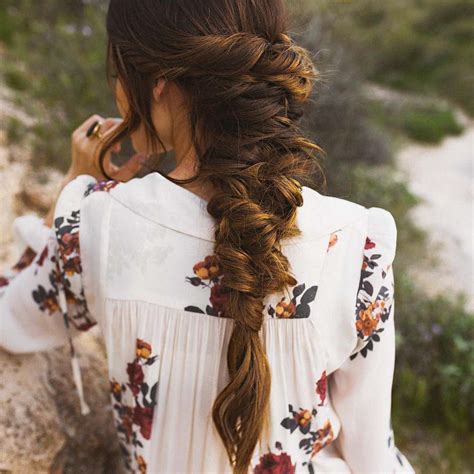 Pick up a new section of hair from directly behind where you've dropped the top piece. 50 Braided Wedding Hairstyles We Love