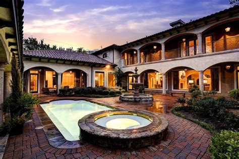 These have been called hacienda and or mexican style homes in the video. Courtyard Mediterranean Style House Plans Hacienda Homes ...