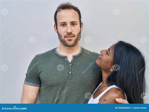 Man And Woman Interracial Couple Hugging Each Other Over White Background Stock Image Image Of