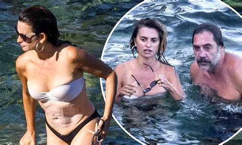 Penelope Cruz Flashes Taut Tummy As She Swims With Husband Javier