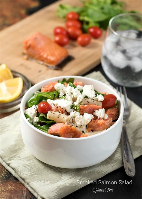 This smoked salmon spinach salad features flavorful smoked salmon, tender baby spinach, crisp apples, chewy raisins and toasted almonds all tossed in lemon vinaigrette. Smoked Salmon Salad {Gluten Free} | Nutritious Eats