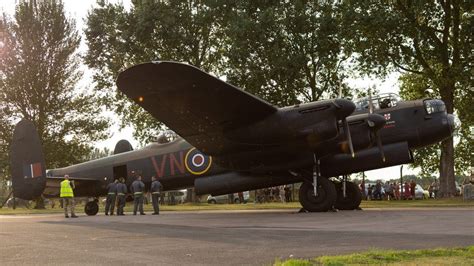 Raf Coningsby Lancaster Bomber Returns Home After Service Bbc News