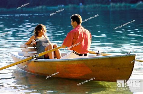 Couple At A Romatic Boattrip With A Rowboat On A Lake Stock Photo Picture And Rights Managed
