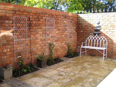 Reclaimed Brick Walls In A Small Courtyard Garden From A Garden Design