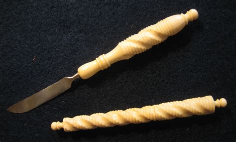Matching carved bone needle case and embroidery knife. Likely English ...