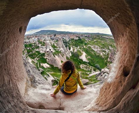 Woman Sitting In Cappadocia Valley Of Turkey — Stock Photo © Natamc