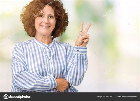 Beautiful Middle Ager Senior Woman Wearing Navy Shirt Isolated