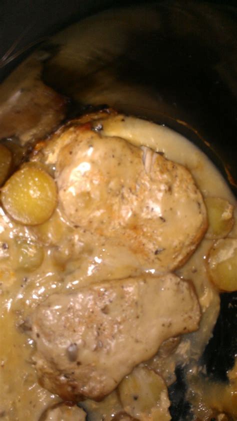 Skillet pork chops with potatoes and onions. pork chops and scalloped potatoes with cream of mushroom soup