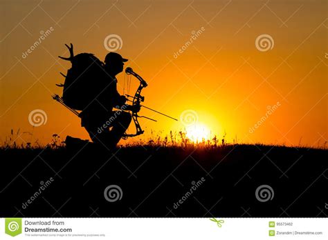 Silhouette Of A Bow Hunter Stock Photo Image Of Sunrise 95573462