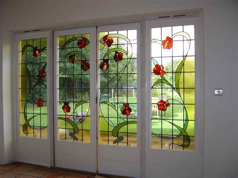 Use sanded glass/stained glass which brings in light but people can't see the details, and/or place the window high up in the room. Stained Glass Patterns For French Doors | Stained glass ...