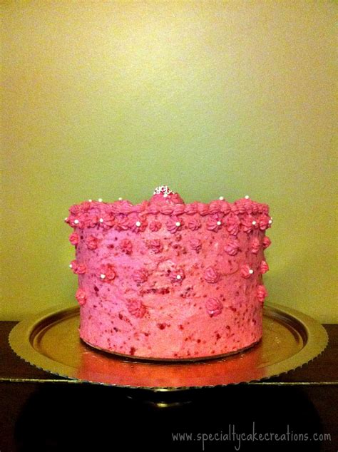 Simple pink rosettes adorn this light blue cake designed just for mom! Simple Pink Mother's Day Cake