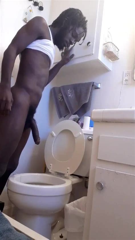 Big Black Men Pissing In Toilet 2