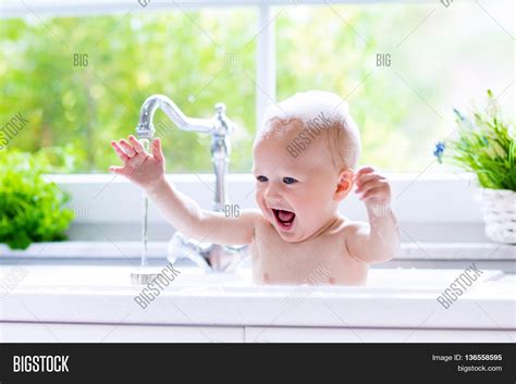 Swim, diving, baby, infant, taking bath. Baby Taking Bath Image & Photo (Free Trial) | Bigstock