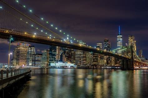 Walking The Brooklyn Bridge At Sunset Night