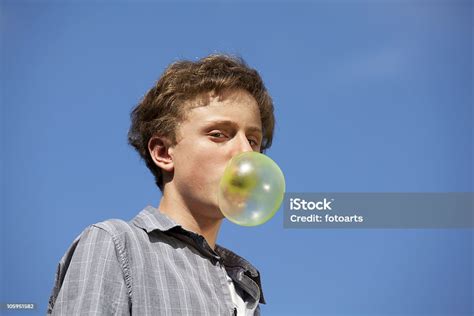 Teenager With Huge Chewing Gum Bubble Stock Photo Download Image Now
