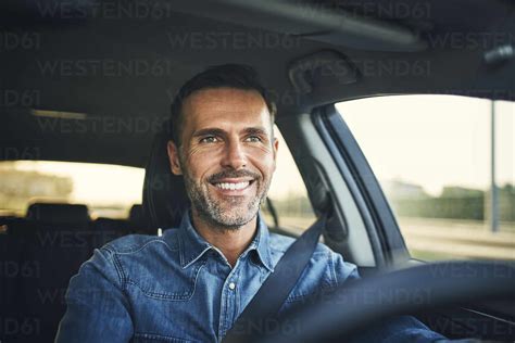 Handsome Man Driving A Car Stock Photo