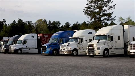 Semi Trucks Parked At A Truck Stop Parking Area Rural Hwy 1 Stock