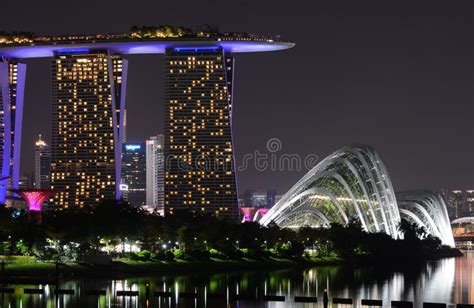 Marina Bay Sands And Gardens By The Bay In Singapore At Night Editorial