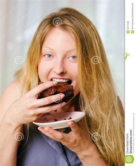 Bronde hair = blonde + brown and these are 15 gorgeous examples. Female eating a brownie stock image. Image of long ...