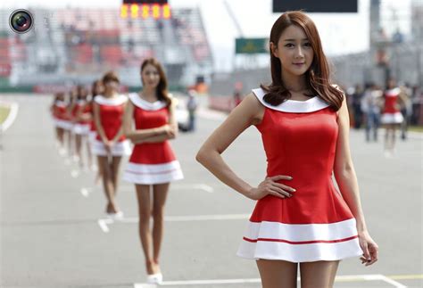 formula one grid girls stand before the third practice session of the korean f1 grand prix in