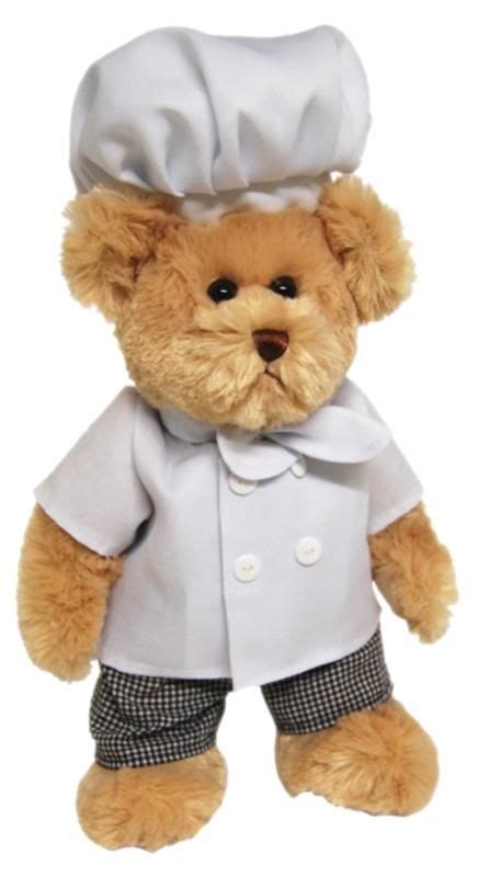 A Stuffed Teddy Bear Wearing A Chefs Outfit